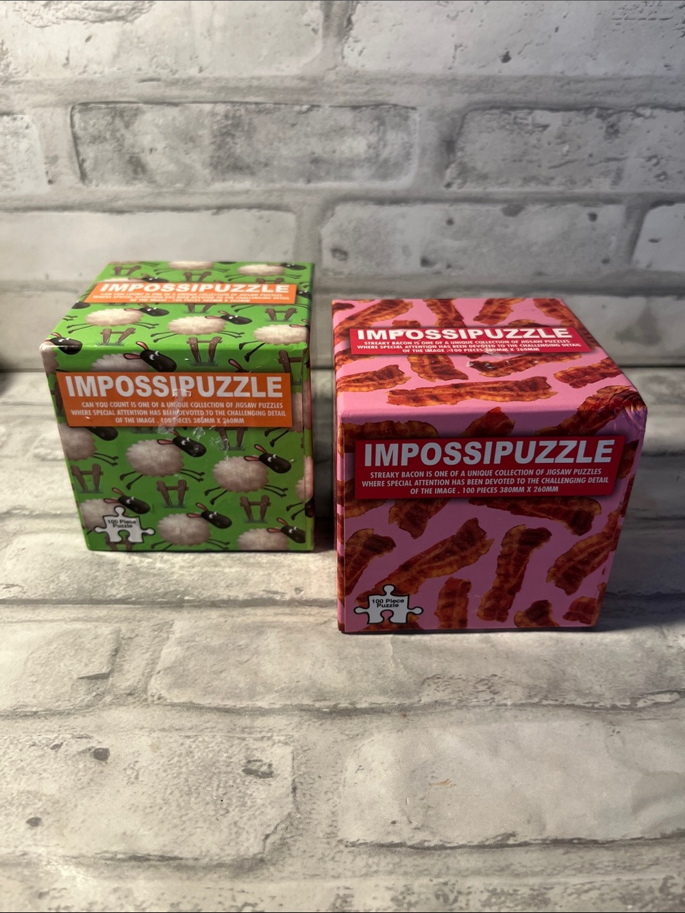 IMOSSIPUZZLE set of 2 100 pieces each sheep and bacon puzzles